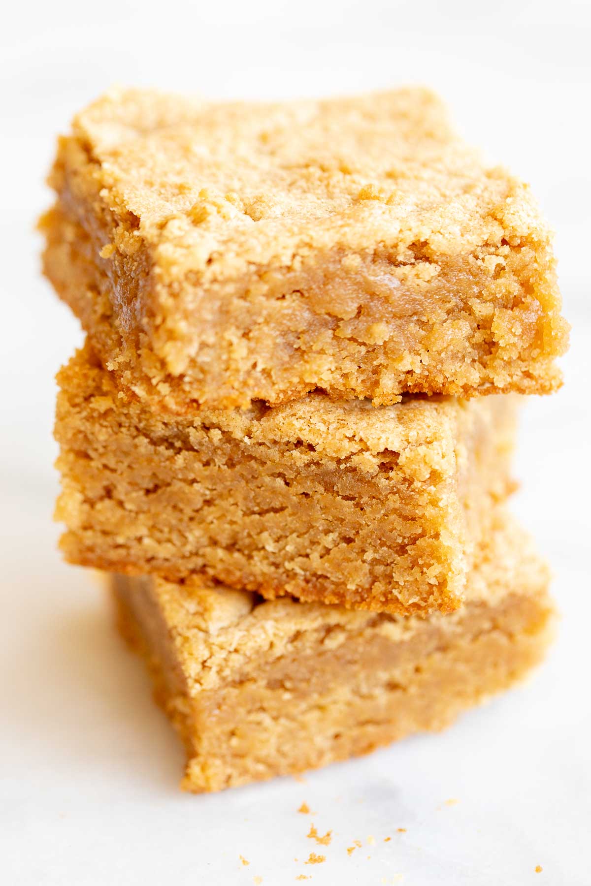 A stack of peanut butter desserts stacked on top of each other.