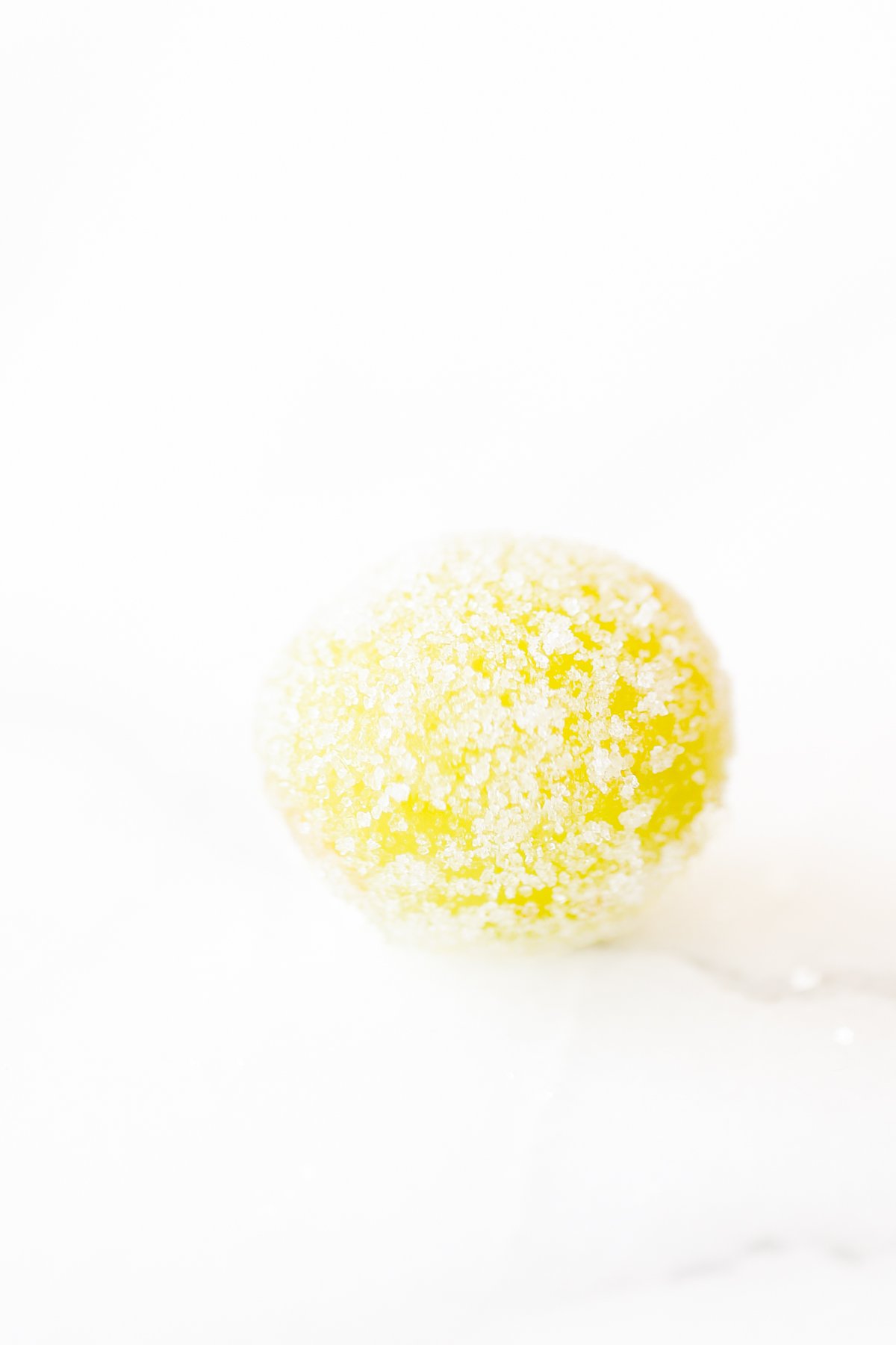 closeup of a grape covered in sugar