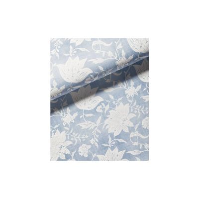 Light blue wallpaper with a white floral pattern, featuring large flowers and leaves.