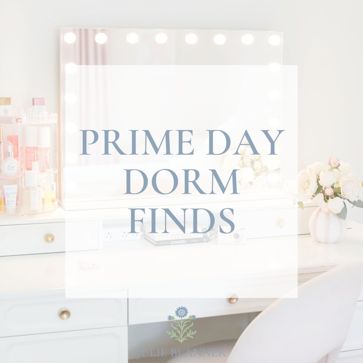 A white vanity desk with beauty products, a lit mirror, and flowers. Text overlay reads "Prime Day Dorm Finds"—perfect for upgrading your space with prime day deals.