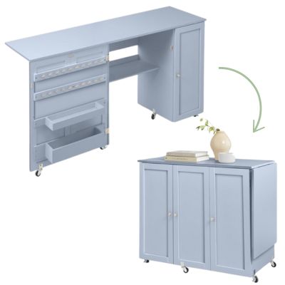 This versatile blue foldable craft cabinet on wheels is perfect for those seeking innovative craft space ideas. It features open and closed positions with ample shelving, and even sports a vase on top for added charm.