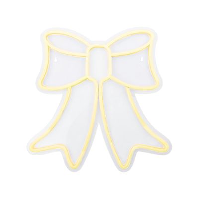 A white bow, outlined in yellow on a plain background, captures the essence of LoveShackFancy Look for Less with its delicate charm and simplicity.