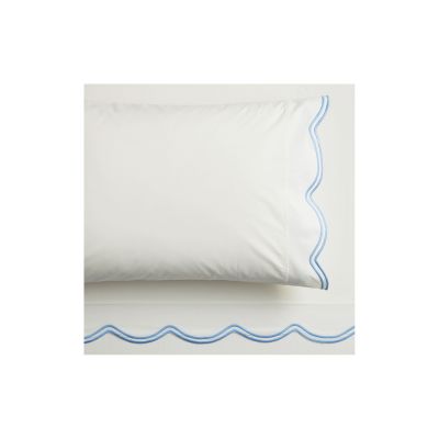 Discover the LoveShackFancy look for less with this white pillowcase and sheet set, featuring elegant blue wavy embroidered edges. Perfect for adding a touch of charm and sophistication to your bedroom decor.